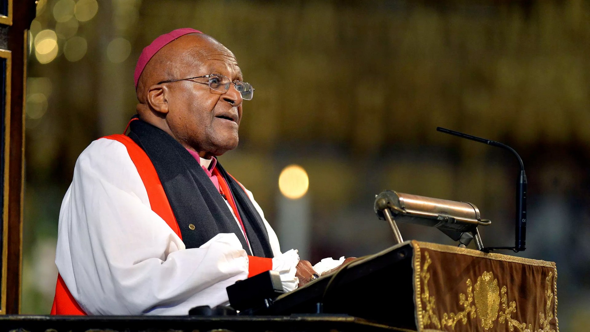 South African archbishop emeritus Desmond Tutu makes an address at Westminster Abbey in London during the memorial service for former South African president Nelson Mandela on March 3, 2014.