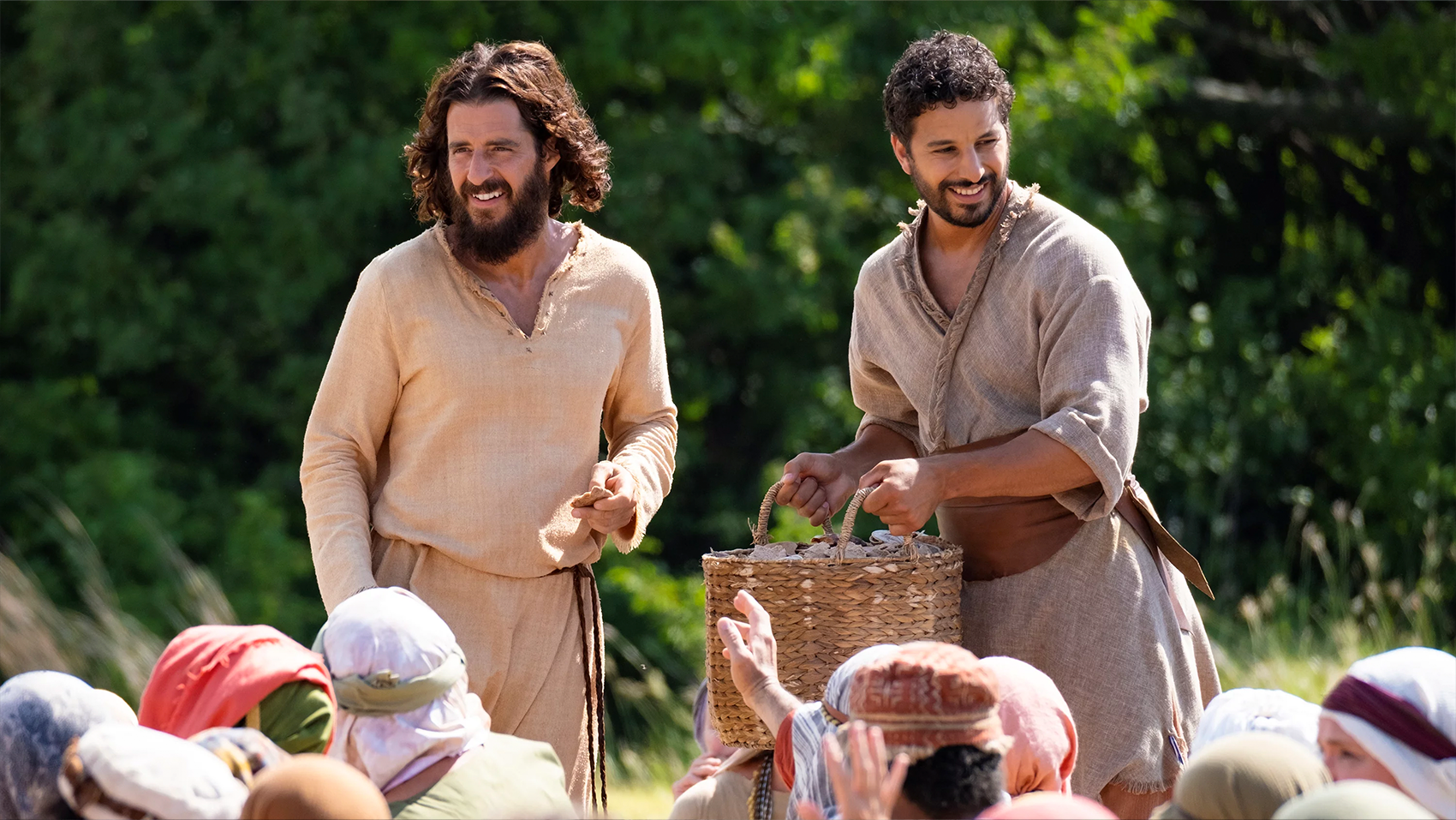 Jesus and Simon the Zealot feed the hungry crowd.