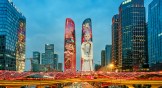 Twin towers in China are illuminated with Ne Zha and Ao Bing from the film, Ne Zha 2.