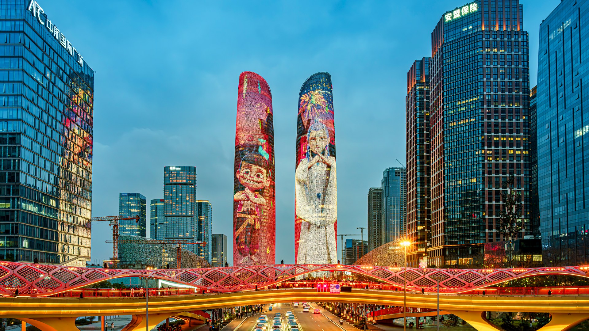 Twin towers in China are illuminated with Ne Zha and Ao Bing from the film, Ne Zha 2.